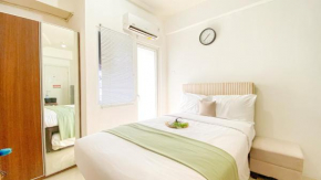 Studio Green Pramuka City Apartment with Mall Access By Travelio